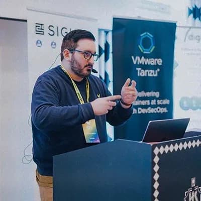 Davide Imola speaking at a conference