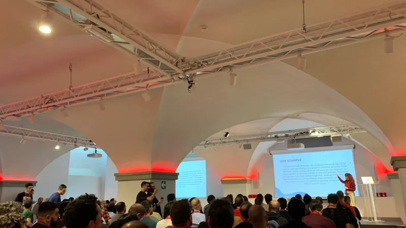 OSDay conference in Florence with speakers and audience